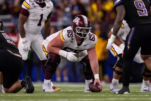 Greg Johnson played center for Minnesota at Washington