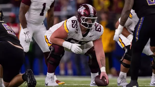 Greg Johnson played center for Minnesota at Washington