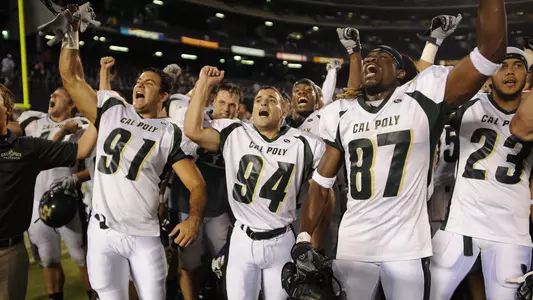 Cal Poly football team celebrating a win.