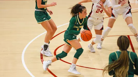 Abbey Ellis of Cal Poly drives at Stanford in Maples Pavilion on Nov. 25, 2020. (Photo by Kyle Calzia)