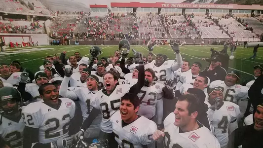 Mustangs celebrate win at Montana in 2005