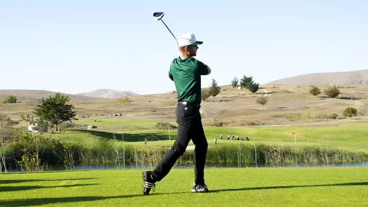 Will Draper walks down fairway at Dairy Creek.