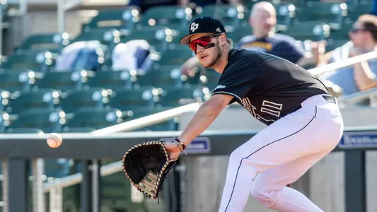 First baseman catching a throw