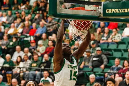 Alimamy Koroma dunks against Hawaii in 2020 Photo by Owen Main