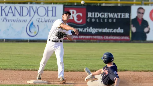 Brooks Lee turning a double play for Willmar.