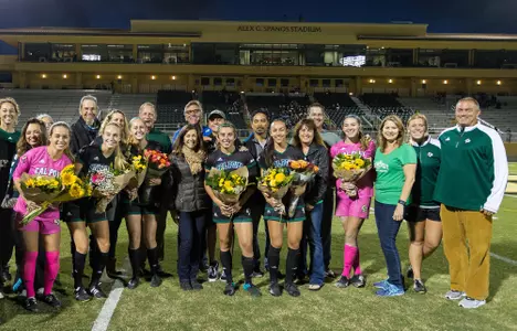 Coach Alex Crozier (at right) celebrates Senior Night with the Mustangs at Spanos Stadium (Photo by Alexander Bohlen)