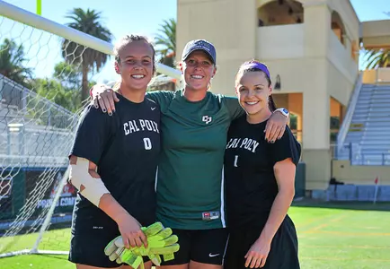 Cal Poly coach Lindsey Smith with goalkeepers before a game