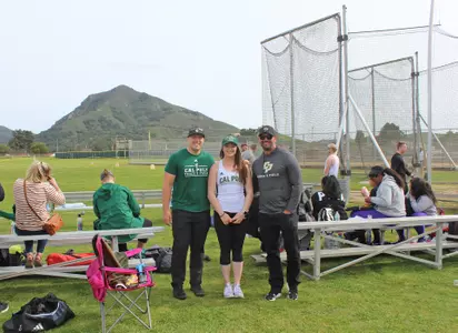 Coach Courtemanche with school record-breaking hammer throws specialist Emily Hallett in 2019