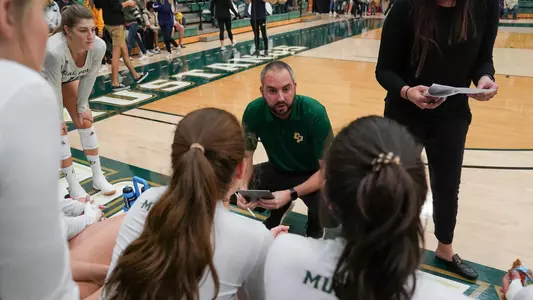 Jason Borchin Coaching in Huddle