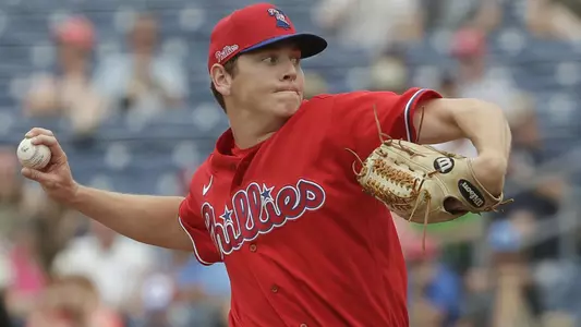 Spencer Howard throws a pitch.