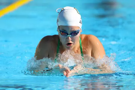 Caroline Judson swims the breaststroke against UCSB 1-30-21