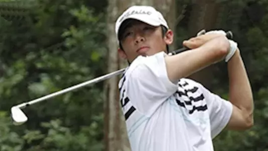 Baron Szeto follows his drive.