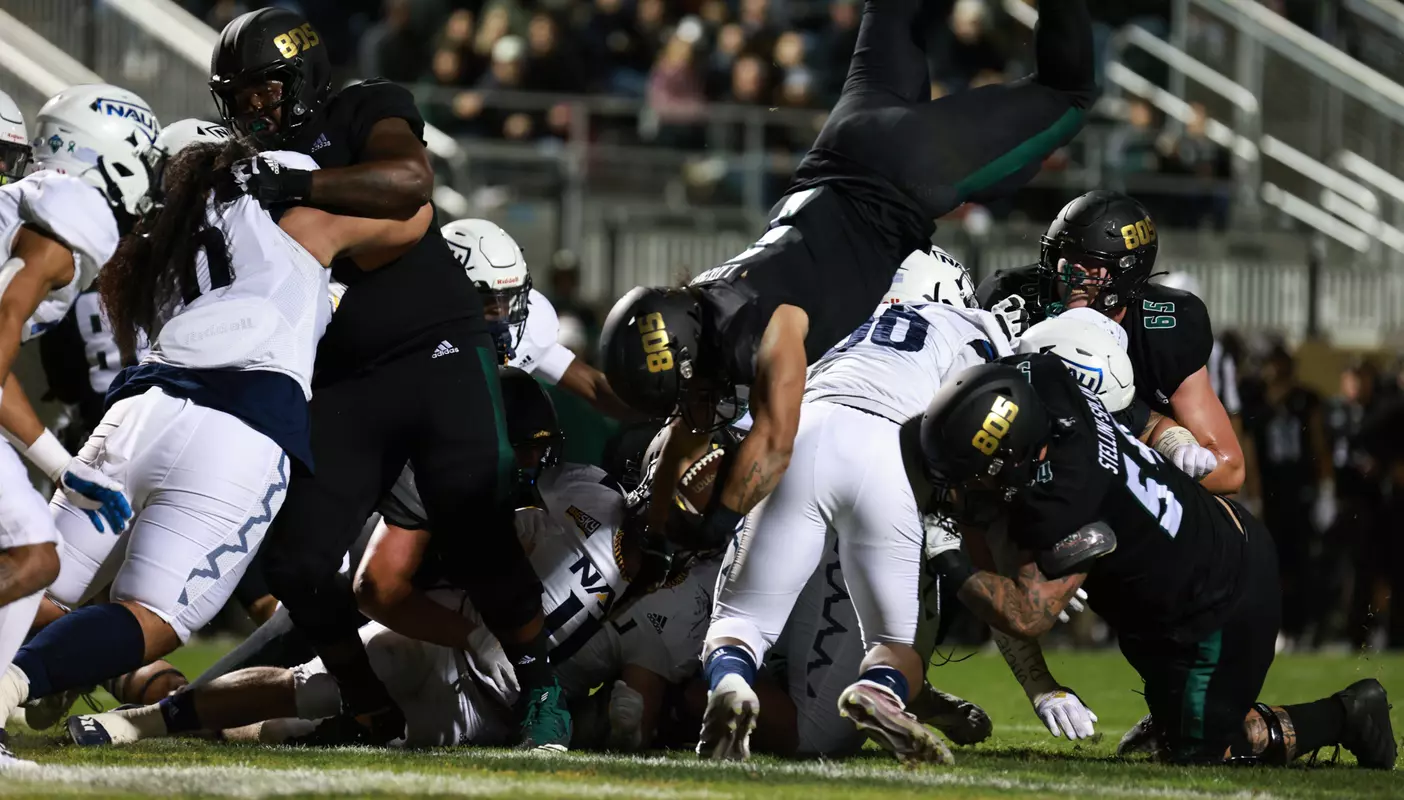 Lepi Lataimua dives oner the line for a touchdown.