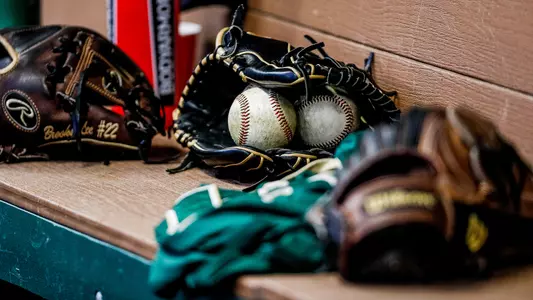 Baseball equipment in Baggett Stadium dugout.