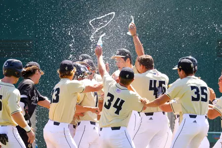 Cal Poly celebrates win over Hawaii.