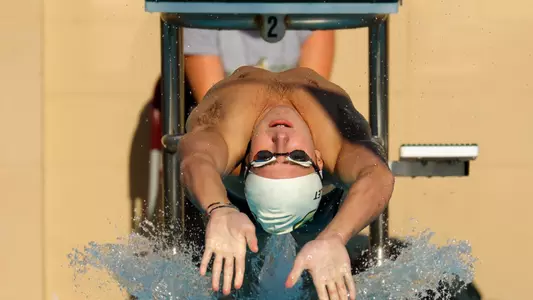 Cal Poly swimming backstroke