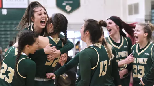 Cal Poly guard Abbey Ellis celebrates her game-winning 3-point shot with Mustang teammates after the victory against Long Beach State on Feb. 20, 2021 in San Luis Obispo, Calif. (Photo by David E. Holmes ©)