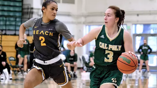 Lily Svetich of Cal Poly brings the ball up the court against Long Beach State in the Mustangs' win at home on Feb. 20, 2021. (Photo by David E. Holmes ©)