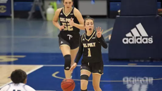 Cal Poly's Abbey Ellis brings the ball upcourt at UC Davis on Feb. 26, 2021. (Photo Courtesy of Owen Yancher / Davis Enterprise ©)