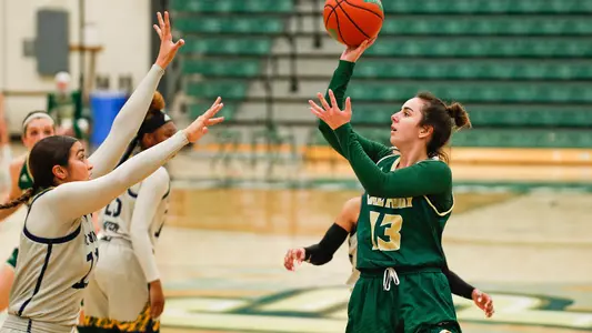 Maddie Vick from Cal Poly attempts a shot vs. UC Irvine in 2021 (Photo by Owen Main ©)