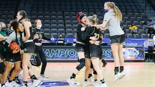 Cal Poly celebrates Maddie Willett's game-winning shot vs. LBSU on March 10, 2021 in Las Vegas. (Photo by Tre Penn ©)