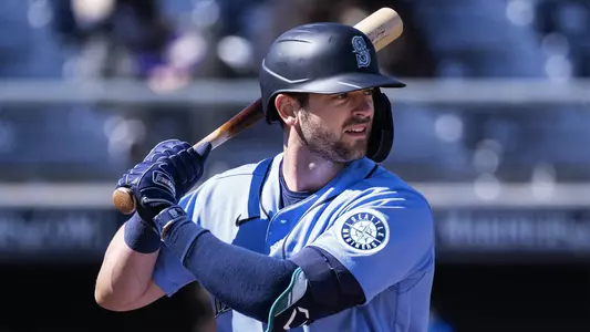 Mitch Haniger bats in spring training game.