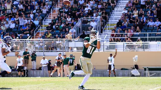 Cal Poly wide receiver Quentin Harrison catches a TD pass vs. San Diego at Alex G. Spanos Stadium on Aug. 31, 2019. (Photo by Owen Main ©)