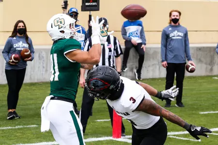 Cal Poly wide receiver Quentin Harrison hauls in a touchdown catch vs. Southern Utah at Alex G. Spanos Stadium on March 13, 2021. (Photo by Owen Main ©)