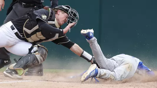 Myles Emmerson applies the tag.