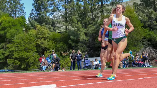 Sierra Brill from Cal Poly runs during a home track meet in 2018. (Photo by Owen Main ©)