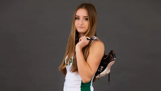 Shelby Daniele from Cal Poly competes in the 100 and 200-meter dash events. (Photo by Owen Main ©)