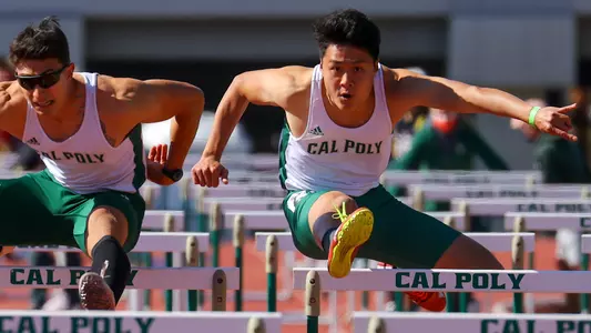 Raymond Yan from Cal Poly competes in the hurdles on April 3, 2021. (Photo by Kyle Calzia)