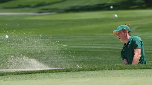 Tanner Podres gets the ball out of a sand trap.