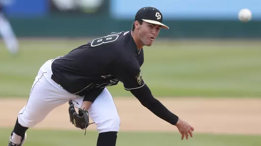 Bryce Warrecker throws a pitch.