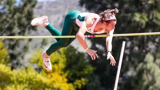 Cal Poly pole vaulter Mathis Bresko clears the bar on April 3, 2021. (Photo by Owen Main ©)