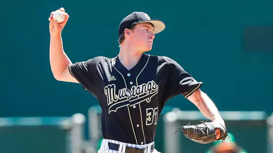 Derek True throws a pitch.