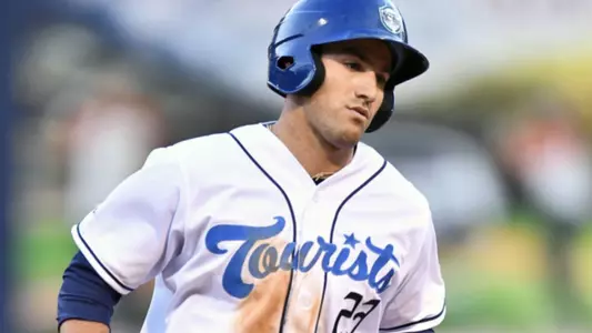 Alex McKenna circling the bases.