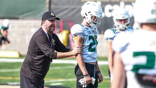 Beau Baldwin instructs a player.