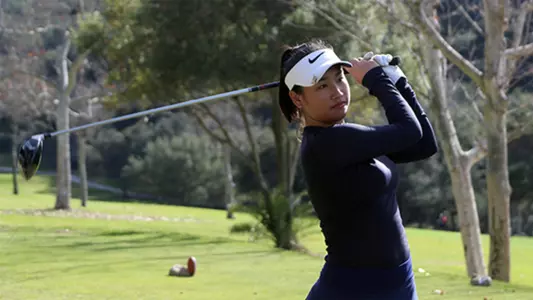 Kamille Dimayuga sends a drive down the fairway.