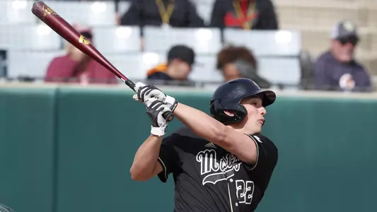 Brooks Lee hits the ball to right field.