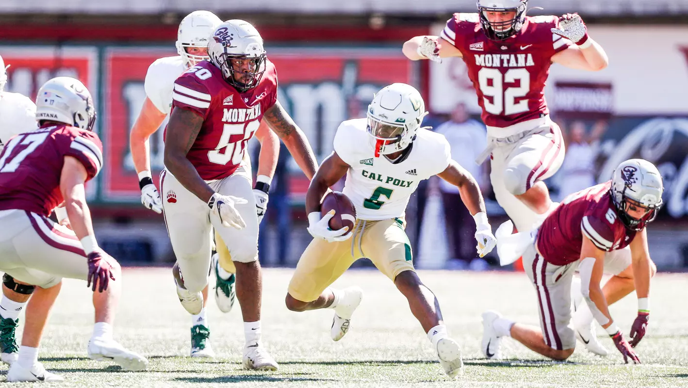 Chris Coleman runs with a catch.