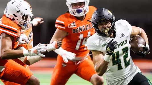 Adam Garwood runs for extra yardage.