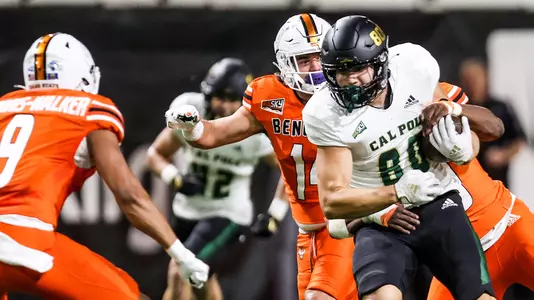 Tight end Josh Cuevas runs for extra yardage.