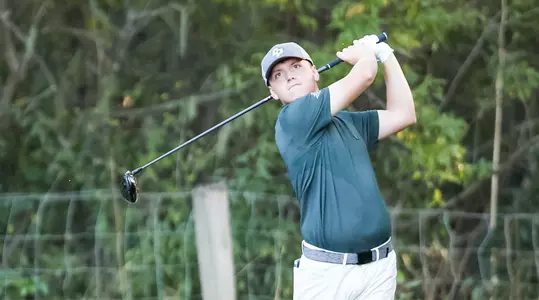 Ross Laird sends a drive down the fairway.