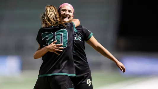 Penn hugs Monserrat Hernandez Marquez after goal, UC Davis, 10-6-22
