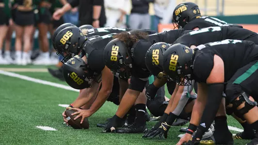 Cal Poly shows off the 805 helmets.