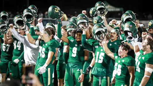 Cal Poly players celebrate season-ending win.