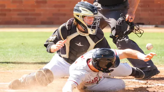 Ryan Stafford can't handle throw in the dirt.