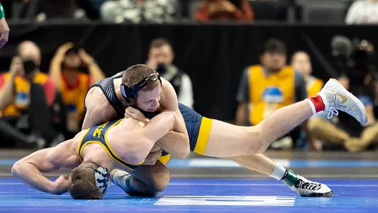 Evan Wick wins his quarterfinal-round match.