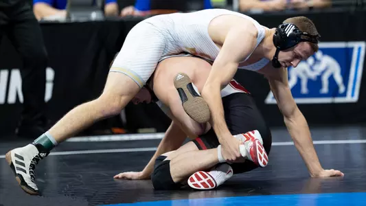 Evan Wick battles Shane Griffith of Stanford.